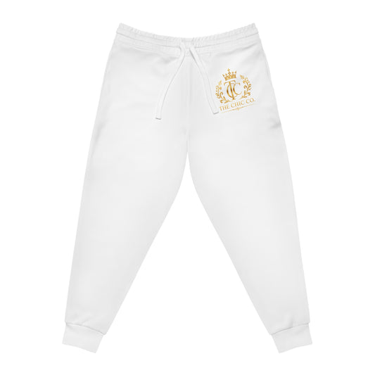 Royal Crest Joggers — 'The Chic Co' Gold Emblem Athletic Pants